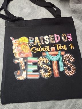 Raised On Sweet Tea & Jesus Black Graphic Tote. 13x15.